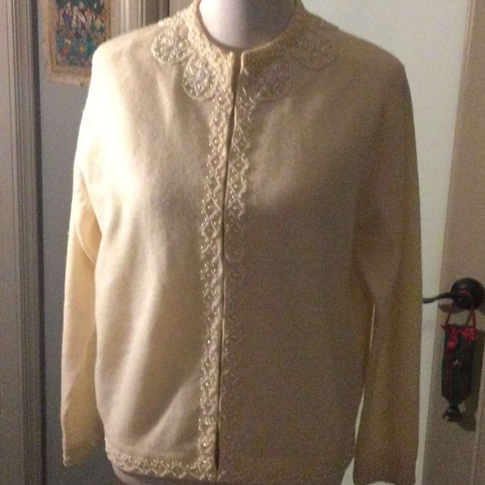 Beautifully beaded, hand loomed cardigan.